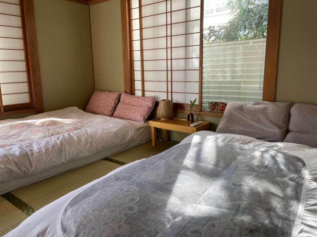 Traditional Japanese room overlooking a quiet courtyard garden